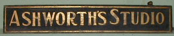 The ASHWORTH SIGN which hung on the side of the building where his studio was located.  This is now in the Buckland Historical Society. 