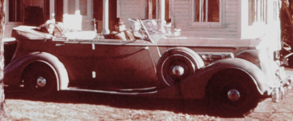  An old photograph of MLP driving RSW in the Packard with his nurse Lena Putnam in the rear seat. 