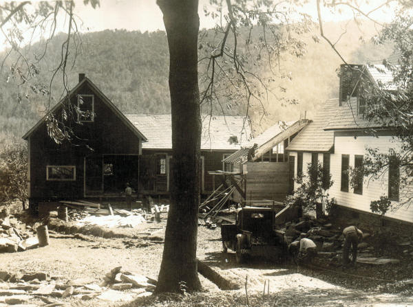  Building of the service yard.  Chicken house inserted between house and blacksmith shop.  