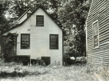 A photograph of the back of the home
