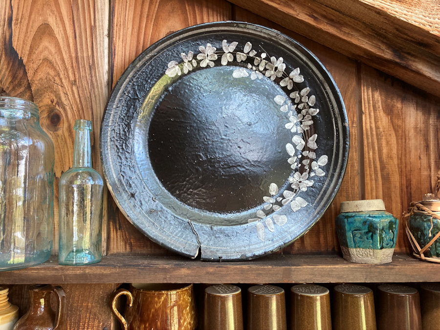 The Italian plate on a shelf in the Southwick Studio.