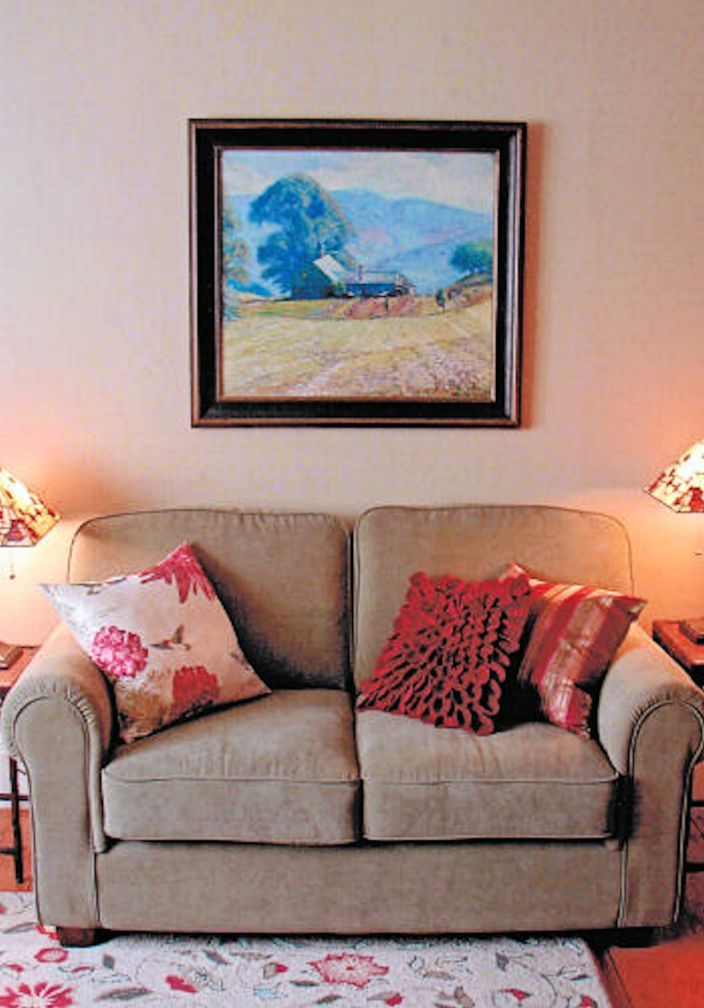 Painting hanging on wall of home