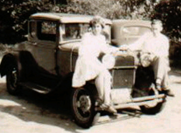 Dr. Mark with his first girlfriend, Alice, and his model A Ford