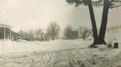 A photograph taken in front of Redgate looking east on Ashfield Road 