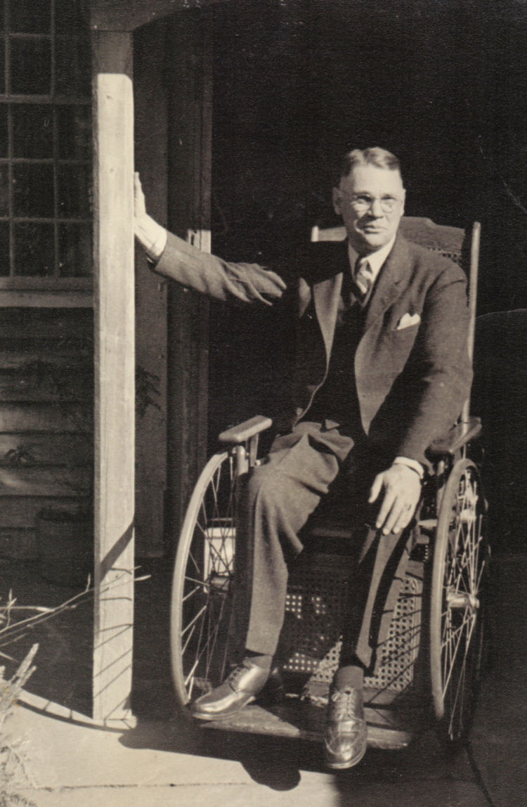 An F. Earl Williams photograph of Robert Strong Woodward in front of his Southwick Studio. 